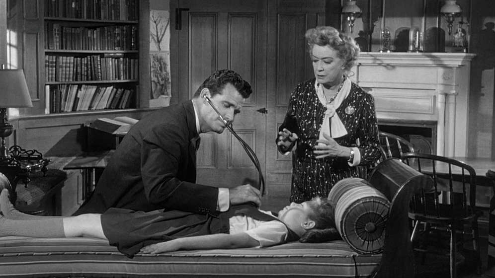 James Garner, Miriam Hopkins y Karen Balkin en La Calumnia