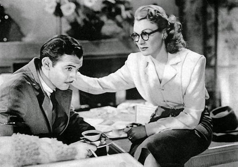 Eve Arden y Zachary Scott en la-infiel