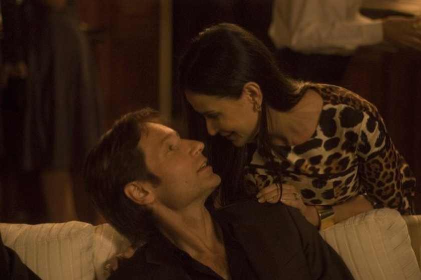 Demi Moore y David Duchovny en La Familia Jones