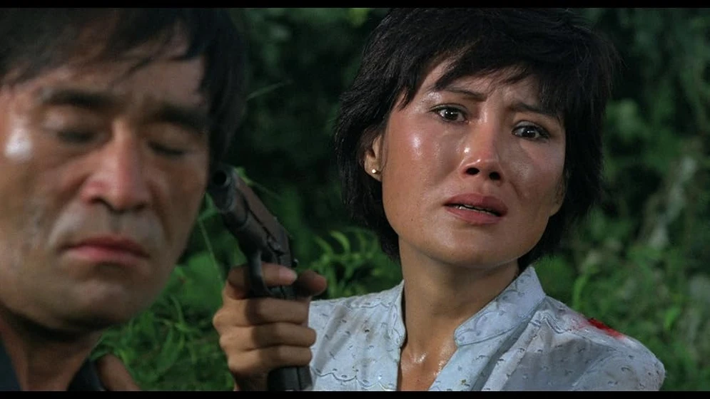 Hai-shu Li y Bruce Jang Il-Sik en heroes-de-guerra-1984