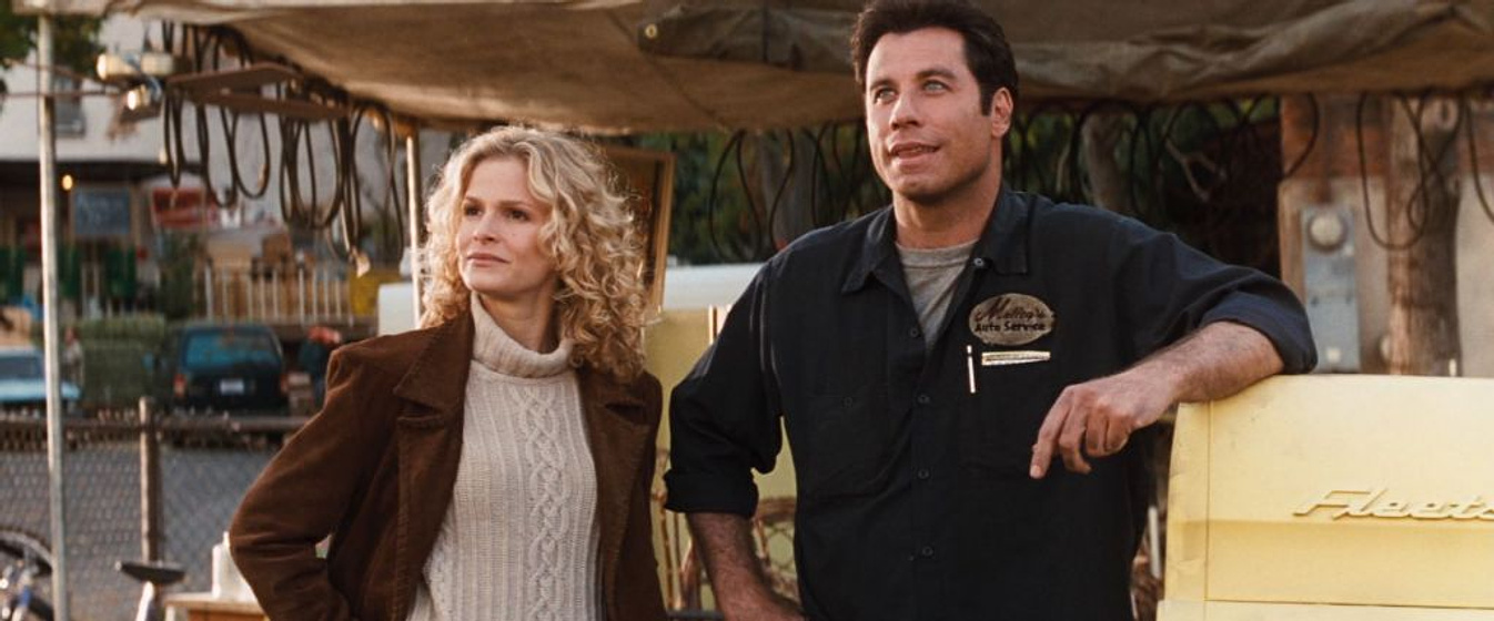 John Travolta y Kyra Sedgwick en Phenomenon: algo extraordinario más allá del amor