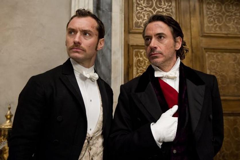 Jude Law y Robert Downey Jr. en Sherlock Holmes: Juego de sombras