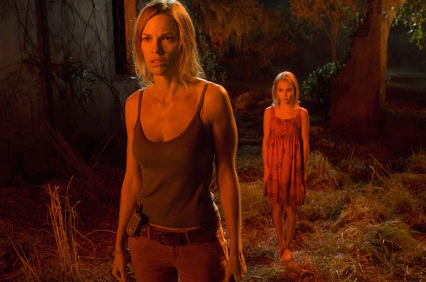 Hilary Swank y Annasophia Robb en la-cosecha-2006