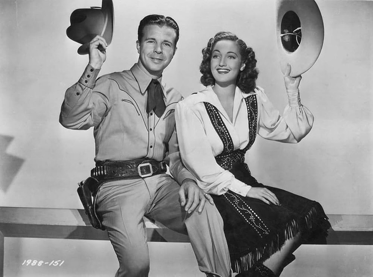 Dick Powell y Dorothy Lamour en En la Cumbre de la Felicidad