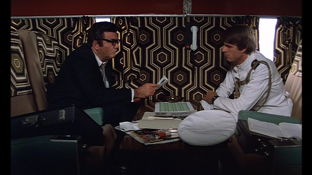 Richard Kennedy y Max Thayer en Ilsa: La Hiena del Harén