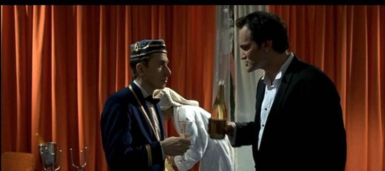 Quentin Tarantino y Tim Roth en Four Rooms