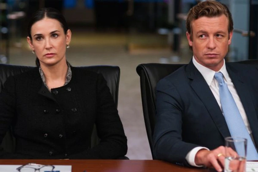 Demi Moore y Simon Baker en margin-call