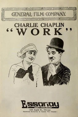 Charlot, trabajando de papelista