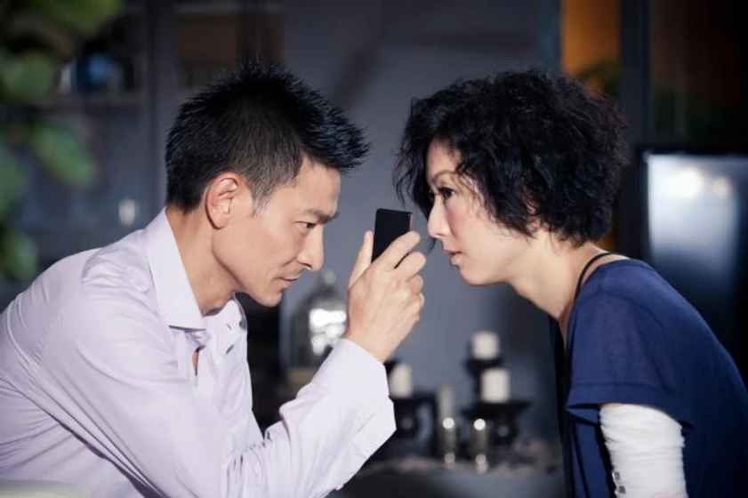 Andy Lau y Sammi Cheng en blind-detective