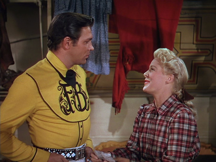 Howard Keel y Betty Hutton en La Reina del Oeste