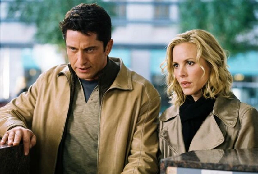 Maria Bello y Gerard Butler en chantaje
