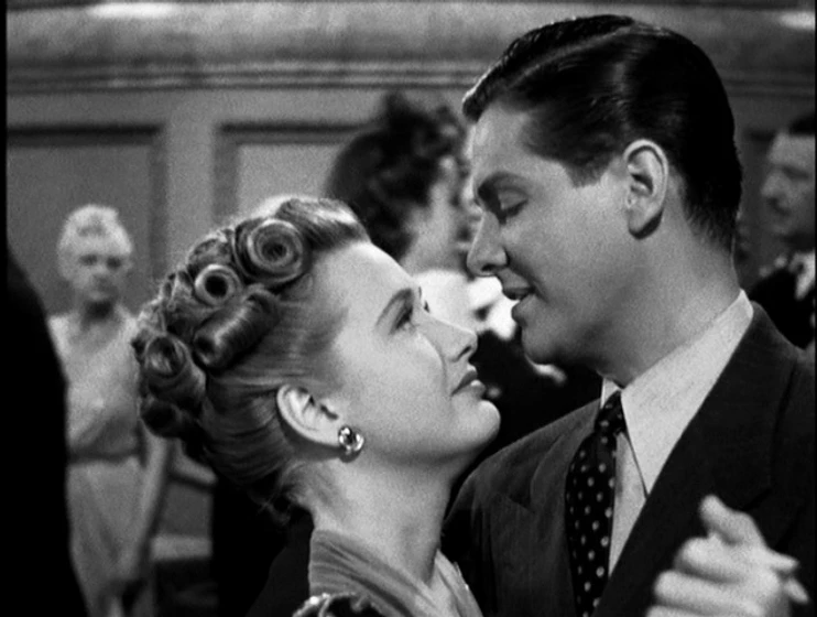 Priscilla Lane y Robert Cummings en sabotaje