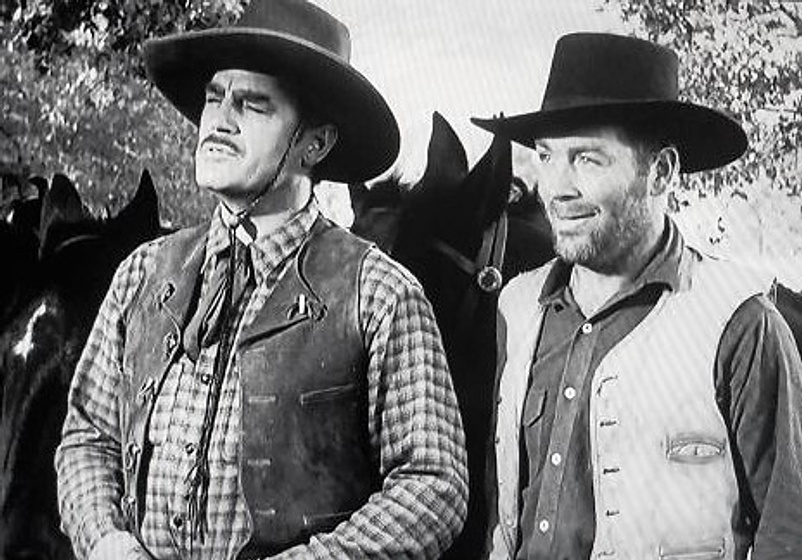 Harry Woods y William Haade en Contrabandistas de Ganado