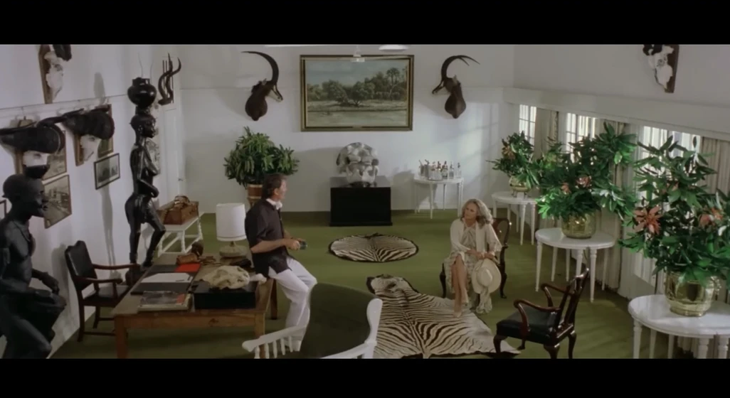 Jack Palance y Ursula Andress en safari-express