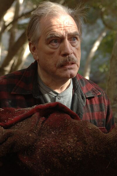 Brian Cox en Red