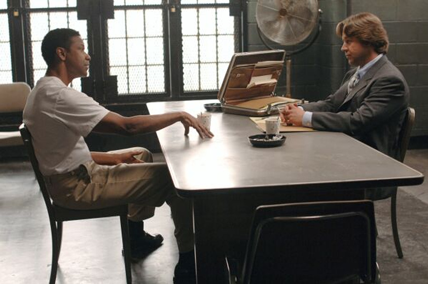 Denzel Washington y Russell Crowe en American Gangster