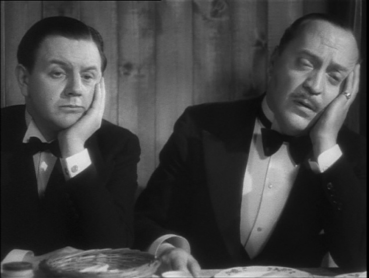 Basil Radford y Naunton Wayne en Alarma en el Expreso