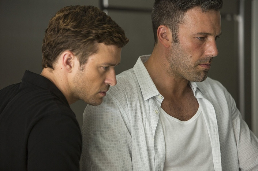 Ben Affleck y Justin Timberlake en Runner Runner