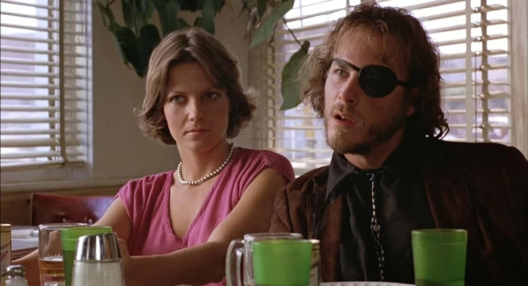 John Heard y Lisa Eichhorn en el-camino-de-cutter