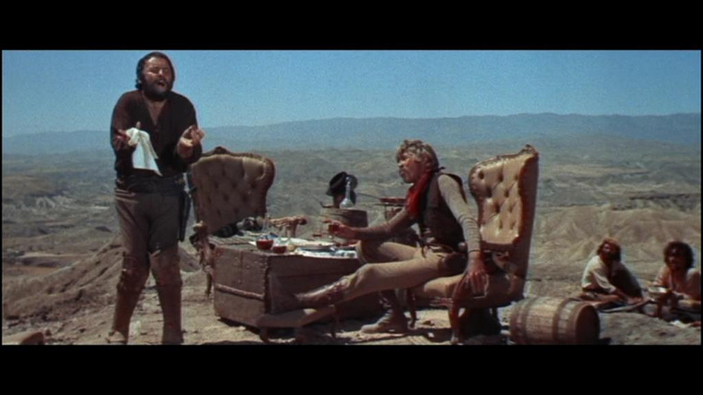 James Coburn y Rod Steiger en Agáchate, maldito