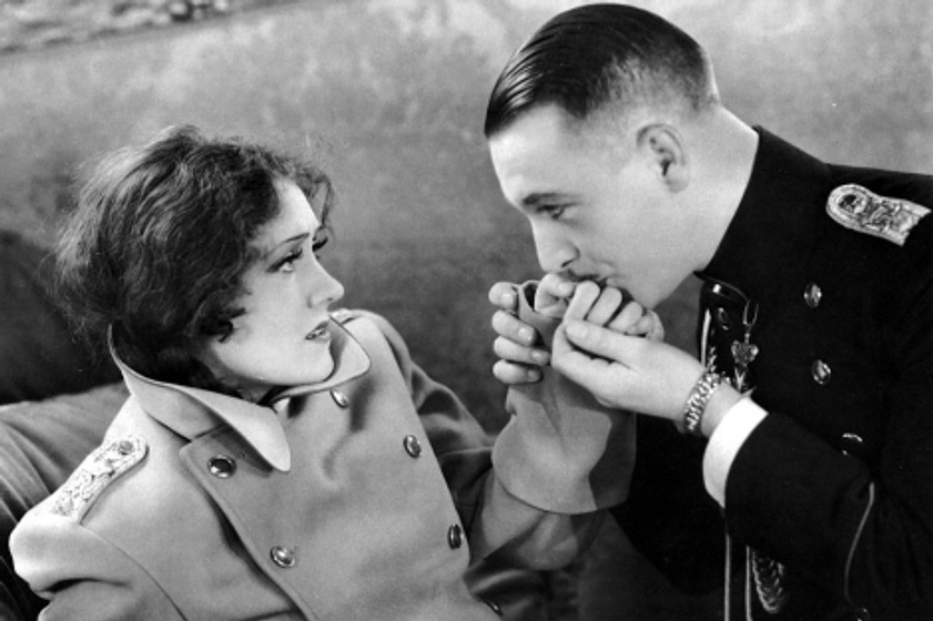 Gloria Swanson y Walter Byron en La Reina Kelly