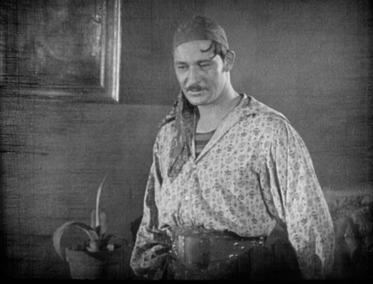Norman Kerry en garras-humanas