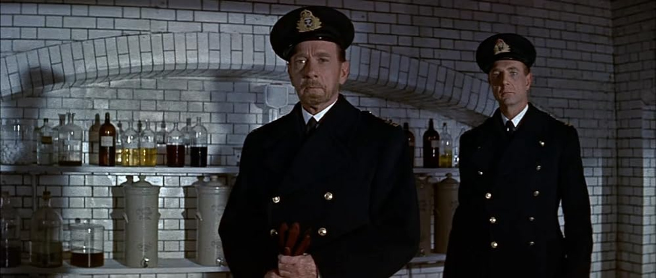 Clifton Webb y Robert Flemyng en el-hombre-que-nunca-existio