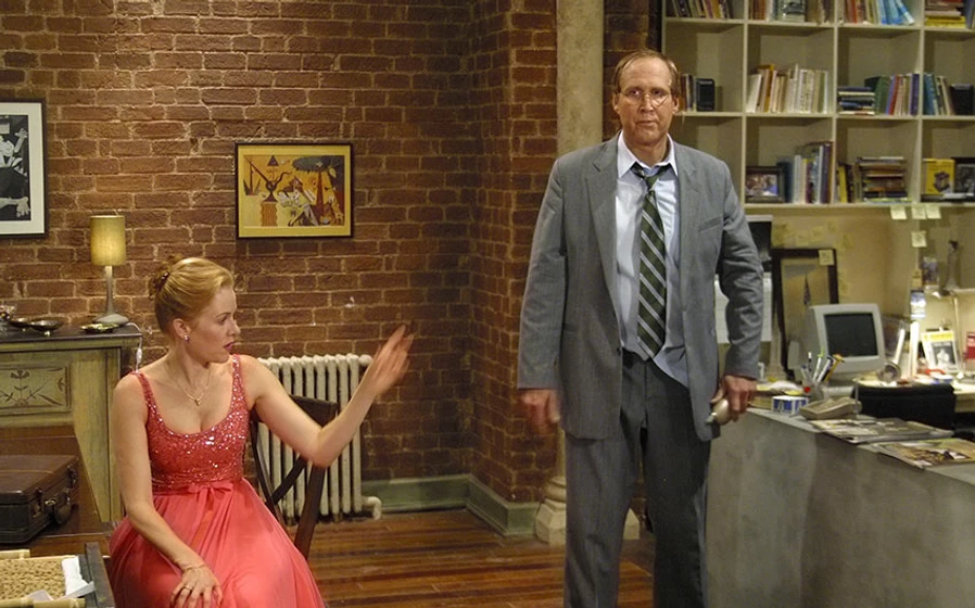 Chevy Chase y Penelope Ann Miller en funny-money
